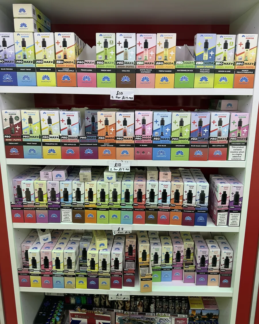 Four shelves of Hayati Pro Max+ kits and pods