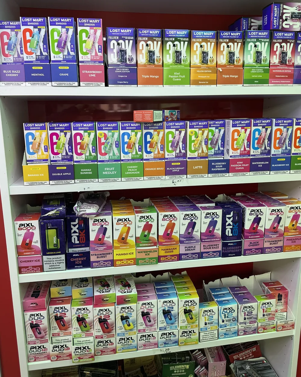 Shelves of Lost Mary and Pixl kits inside Bambo